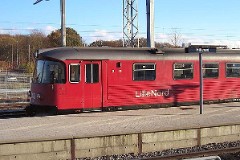 DSB ML/FL trainset photographed at the railway station in Hillerød 8. November 2004.  The ML/FL trainset was built by Duewag and Scandia and was delivered to DSB in 1984 in a number of 7 motorcoaches (ML) and 5 middle section coaches (FL). The trainsets are similar to the Y-class - used by a lot of Danish private railway compagnies. 2 diesel engines a 132 kW. Max speed 80 km/h - 50 mph. Length ML 17 530 mm - FL 17. 450 mm. Weight ML 27 metric tonnes - FL 18 metric tonnes. ML has 47 seats, FL 64 seats all 2nd class. The trainsets were renovated in 1997-1998. The ML/FL is used for the line Hillerød - Helsingør, called "Lille Nord".